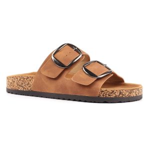 When summer calls for easy elegance, the Rondo Sandal answers. Crafted with soft straps in versatile neutral shades, this slip-on design is elevated with oversized buckles for a modern edge. The cork-effect sole and padded footbed provide all-day comfort, making them ideal for warm-weather getaways, beach strolls, or relaxed city days