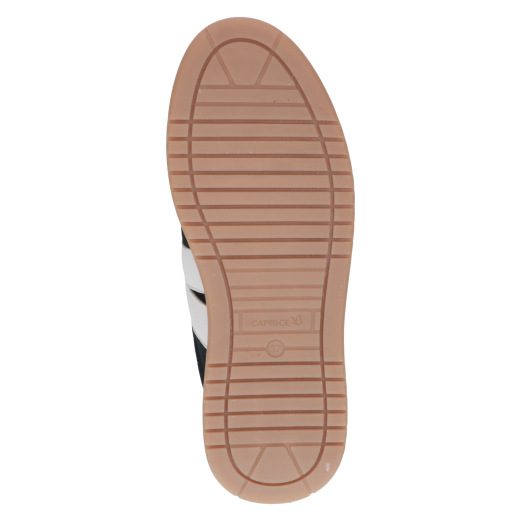 The Caprice trainer is a versatile leather trainer that features both a lace-up front and a functional side zip.